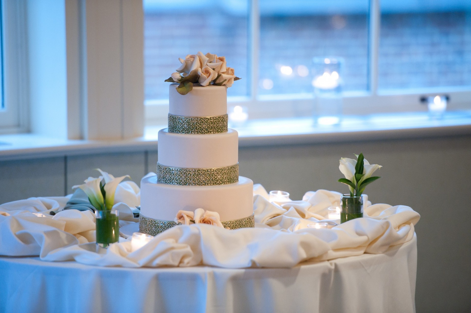 A romantic cake in a romantic setting.