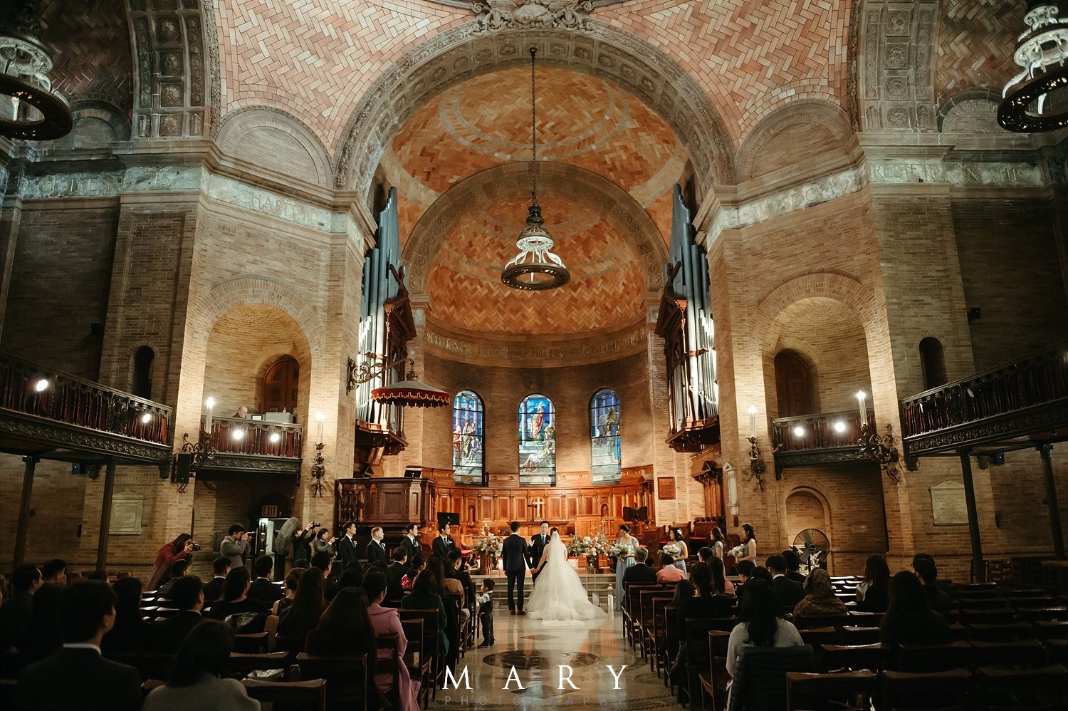 A couple making their way to the altar.