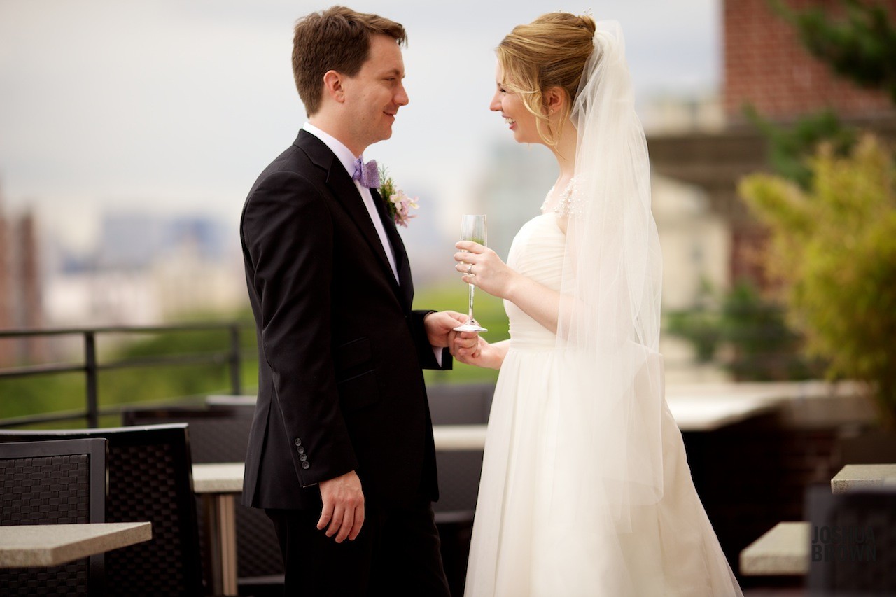 Kathryn & Jordan share a toast on Faculty House's terrace.