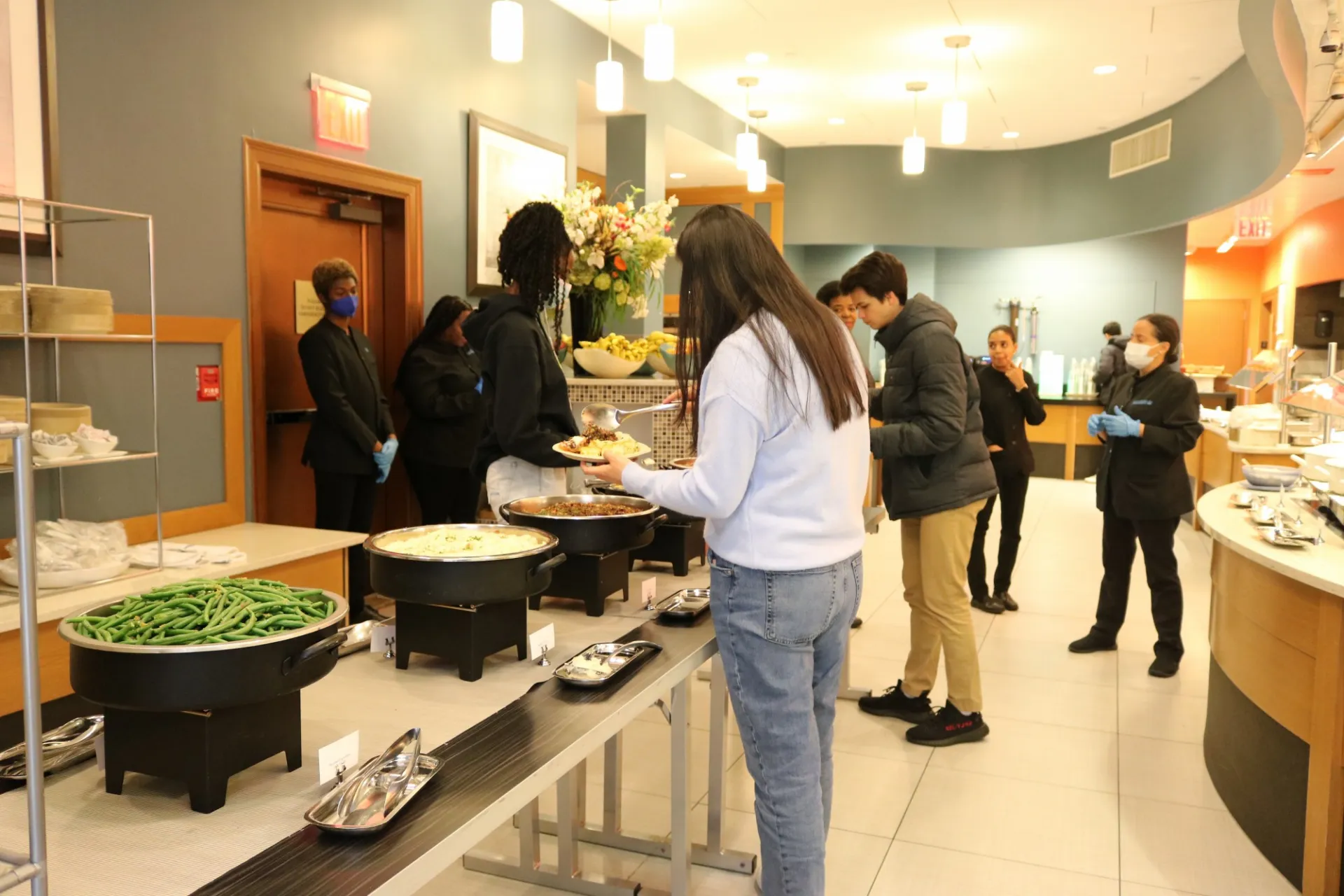 Students in the new servery on the second floor of Faculty House