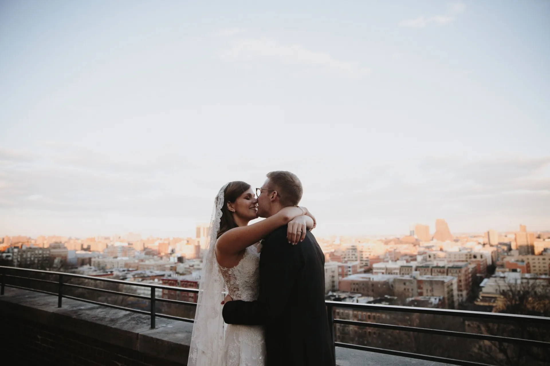 Couple kissing on Faculty House terrace
